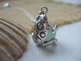 Sea Glass Marble In Frog Pendant
