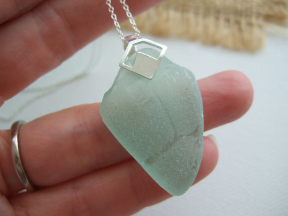 tr letters on coca cola sea glass pendant