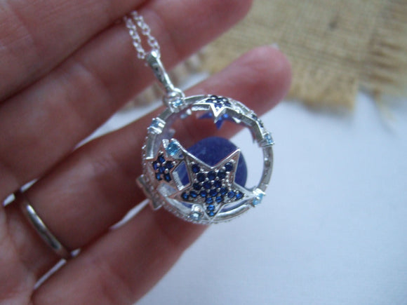 star fish locket with rare blue sea glass marble
