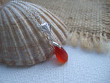 Amberina Red Sea Glass Necklace, red beach glass pendant with leaf setting