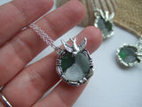 birds nest pendant with sea glass