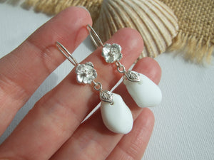 white milk sea glass earrings with flower detail