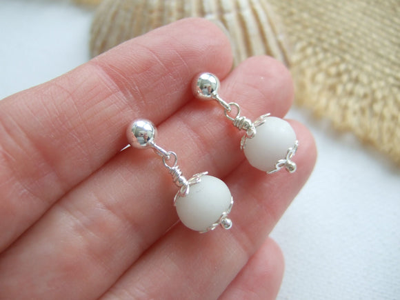 white beach found bead earrings