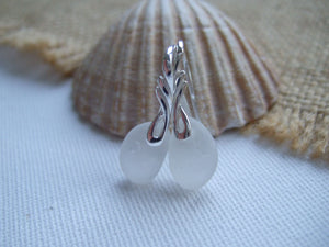 white sea glass and wing design earrings 
