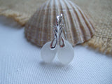 white sea glass and wing design earrings 