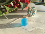 Turquoise Sparkly Fish Locket with Turquoise Sea Glass Marbke